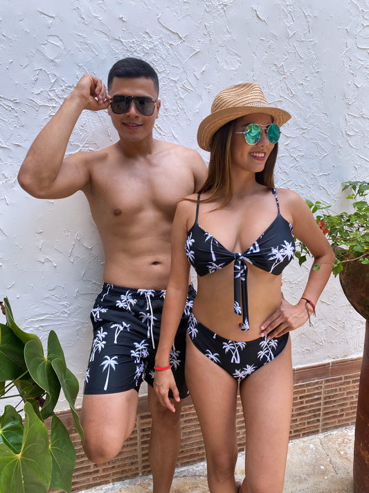 NEGRO CON PALMERAS BLANCAS